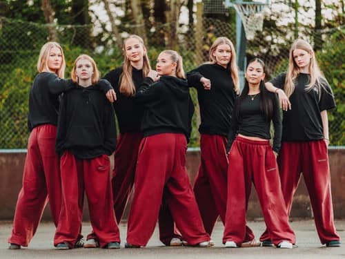 Young creatives performing together on stage