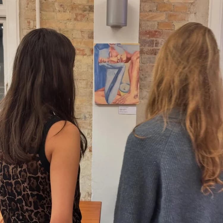 Young painter working on a canvas